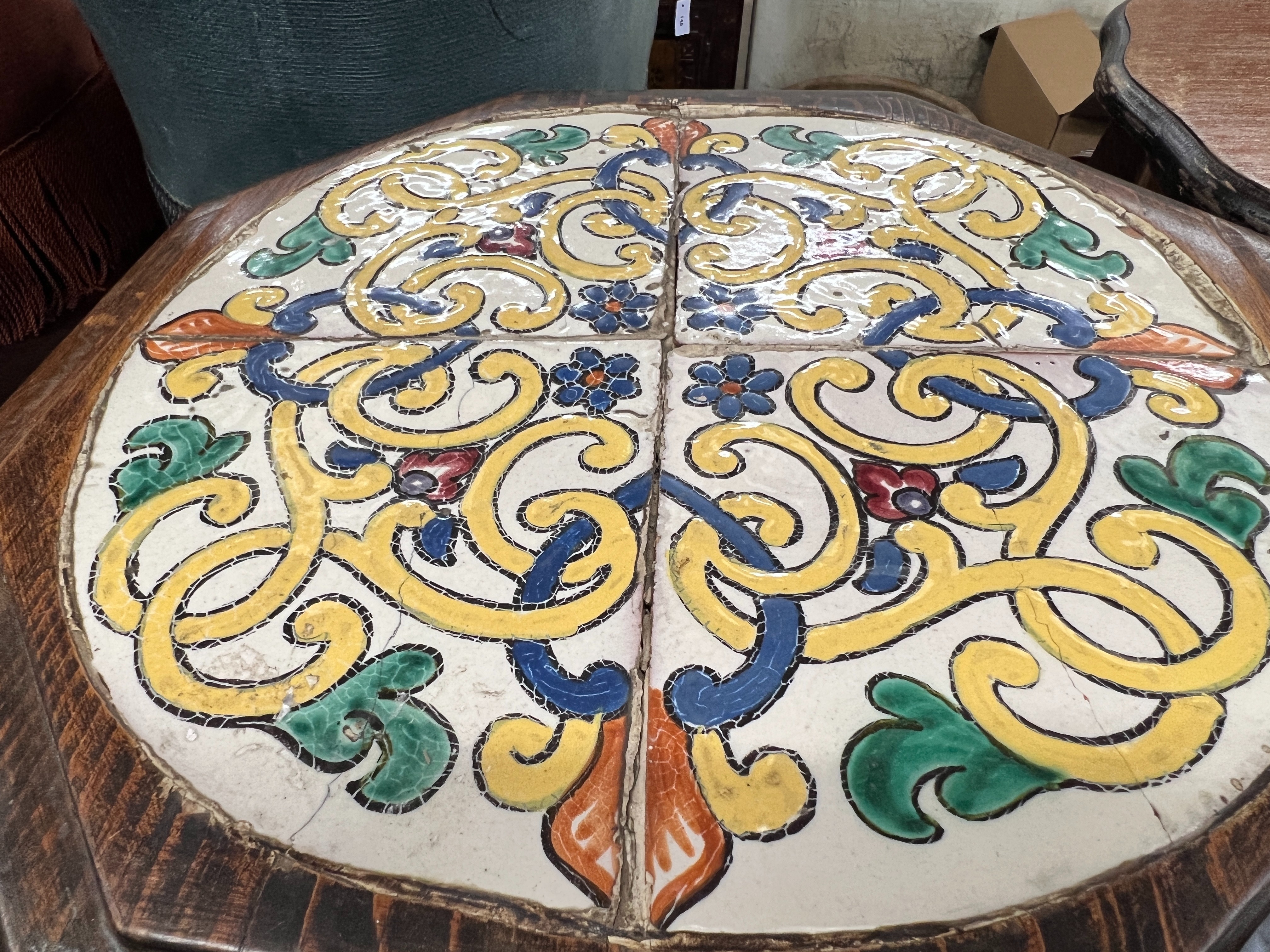 An octagonal oak tile top occasional table, width 42cm, height 46cm and a circular oak work table